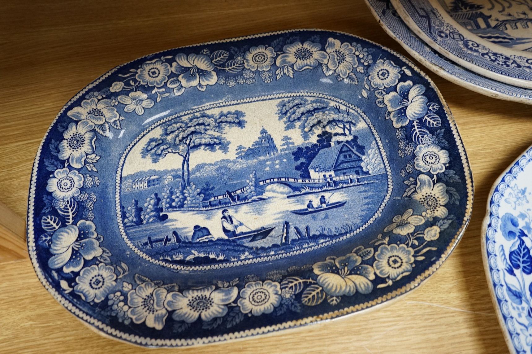 Six 19th century blue and white stoneware meat dishes to include Roger’s Staffordshire zebra pattern, largest 50cm wide. Condition - varies